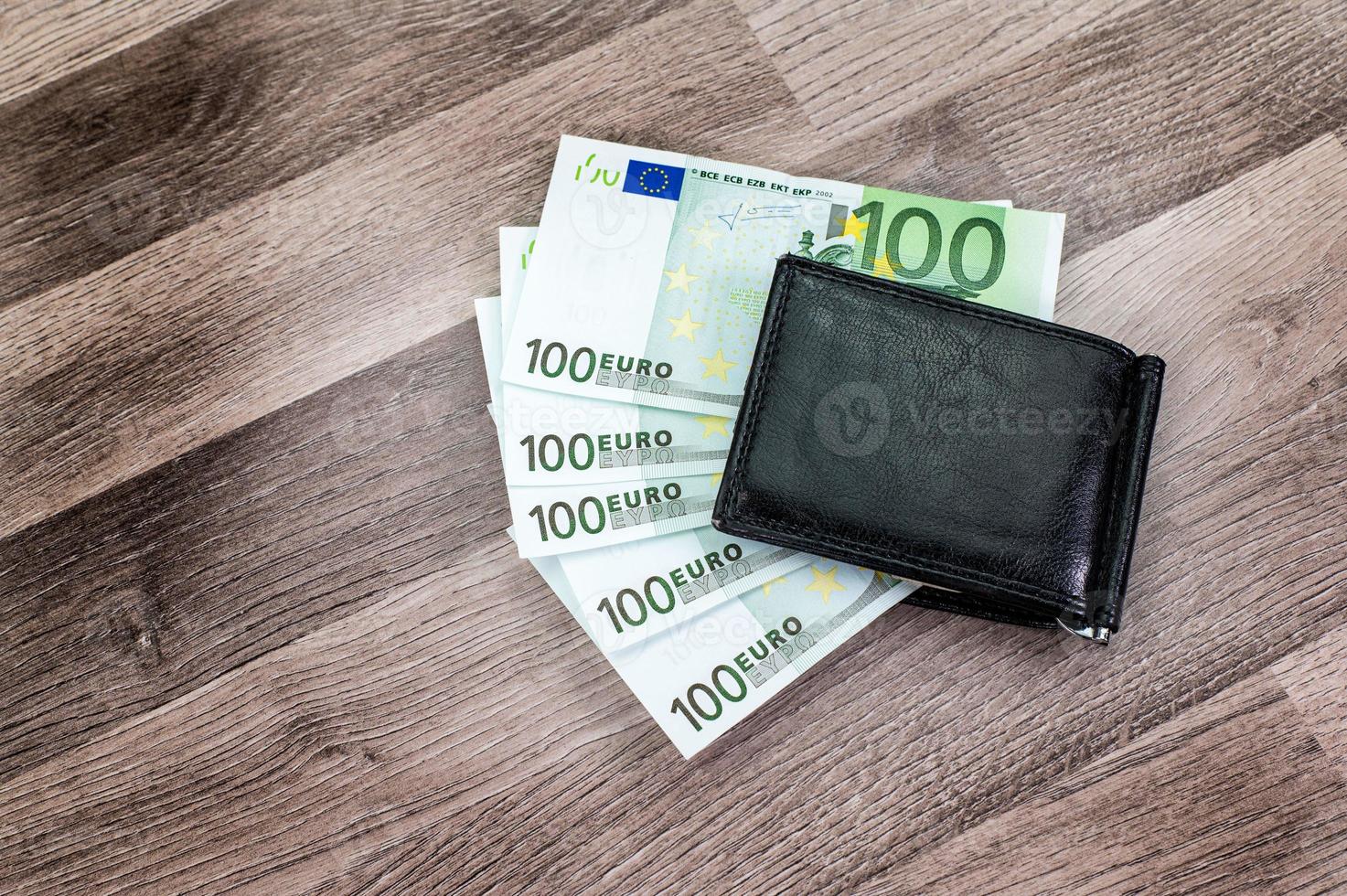 100 euro bills in wallets photo