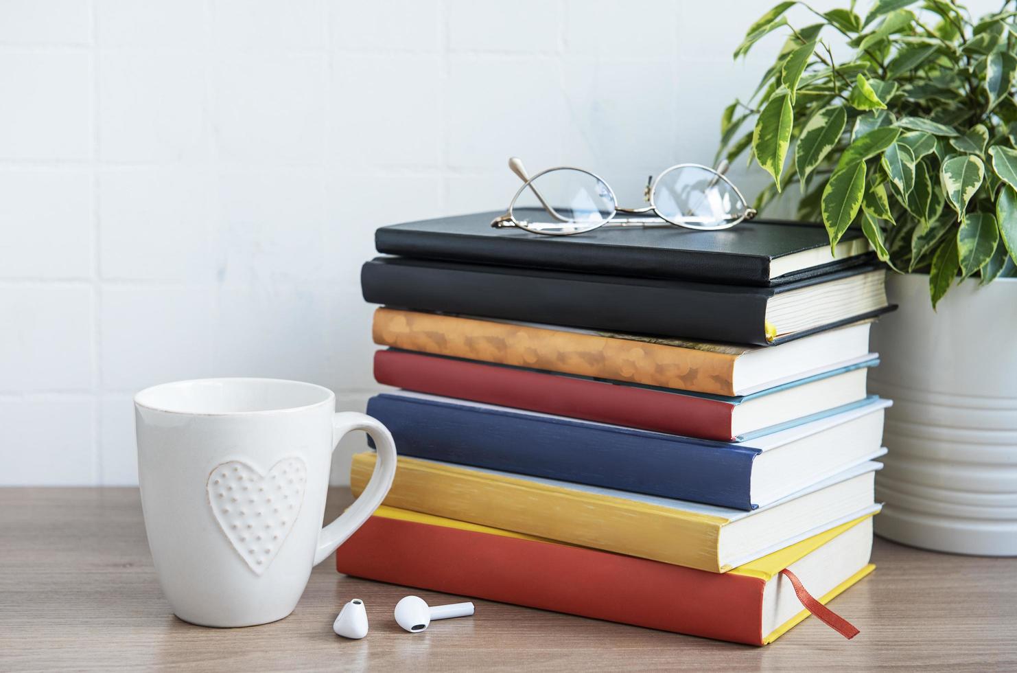 Stack of books on the desktop photo
