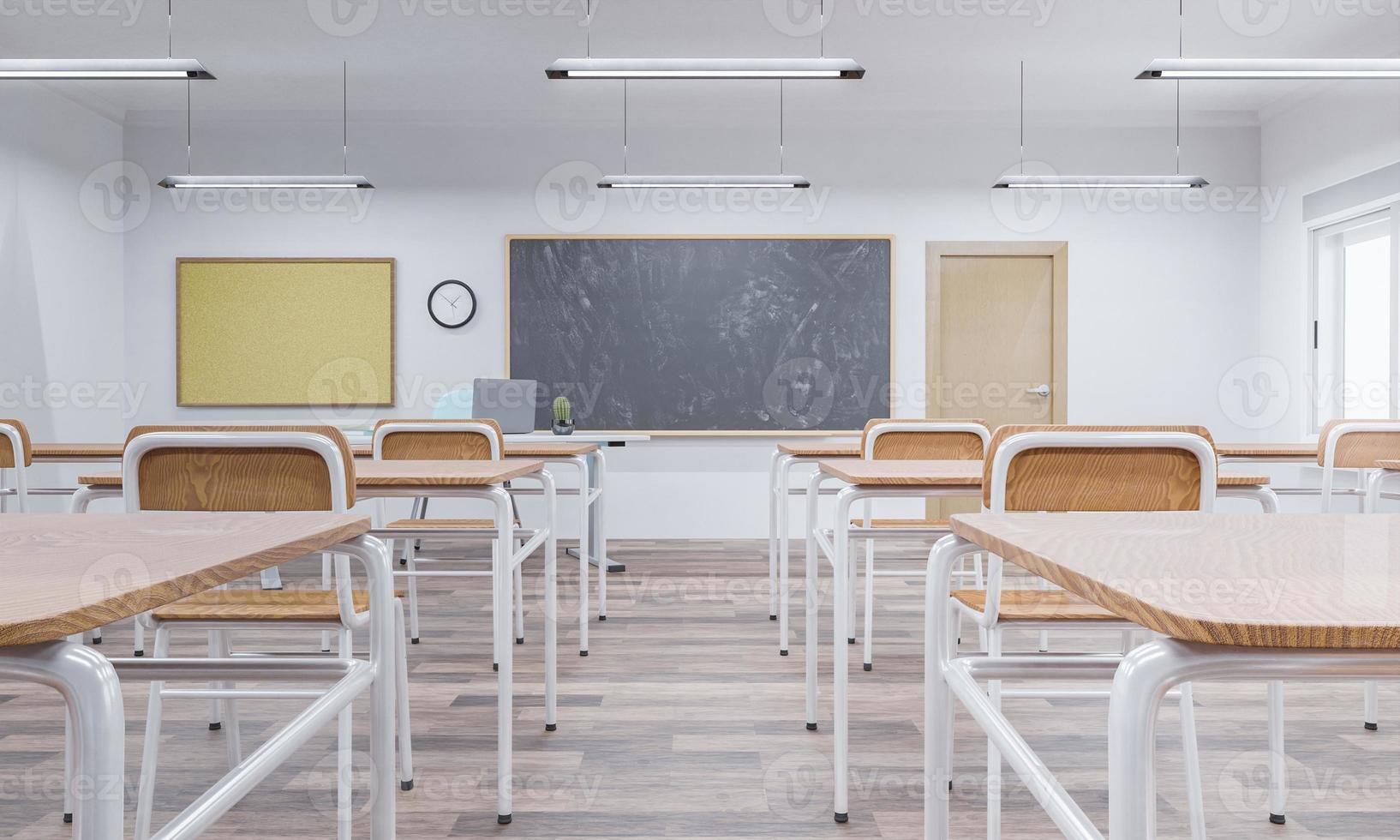 Interior de un aula escolar con pupitres de madera. foto