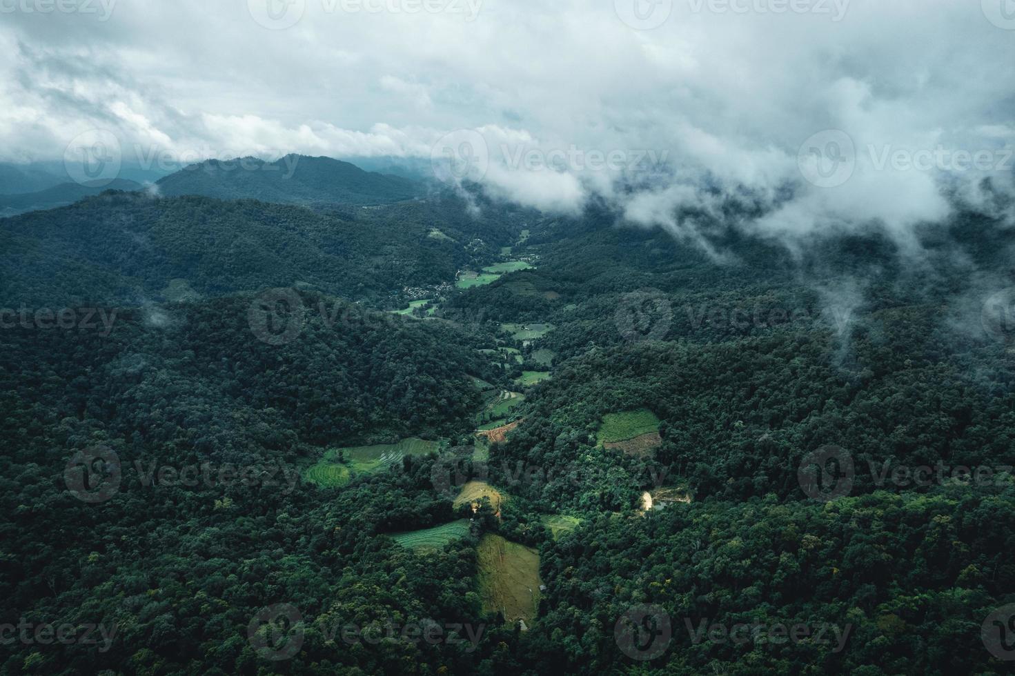 villages and fields in green mountains photo