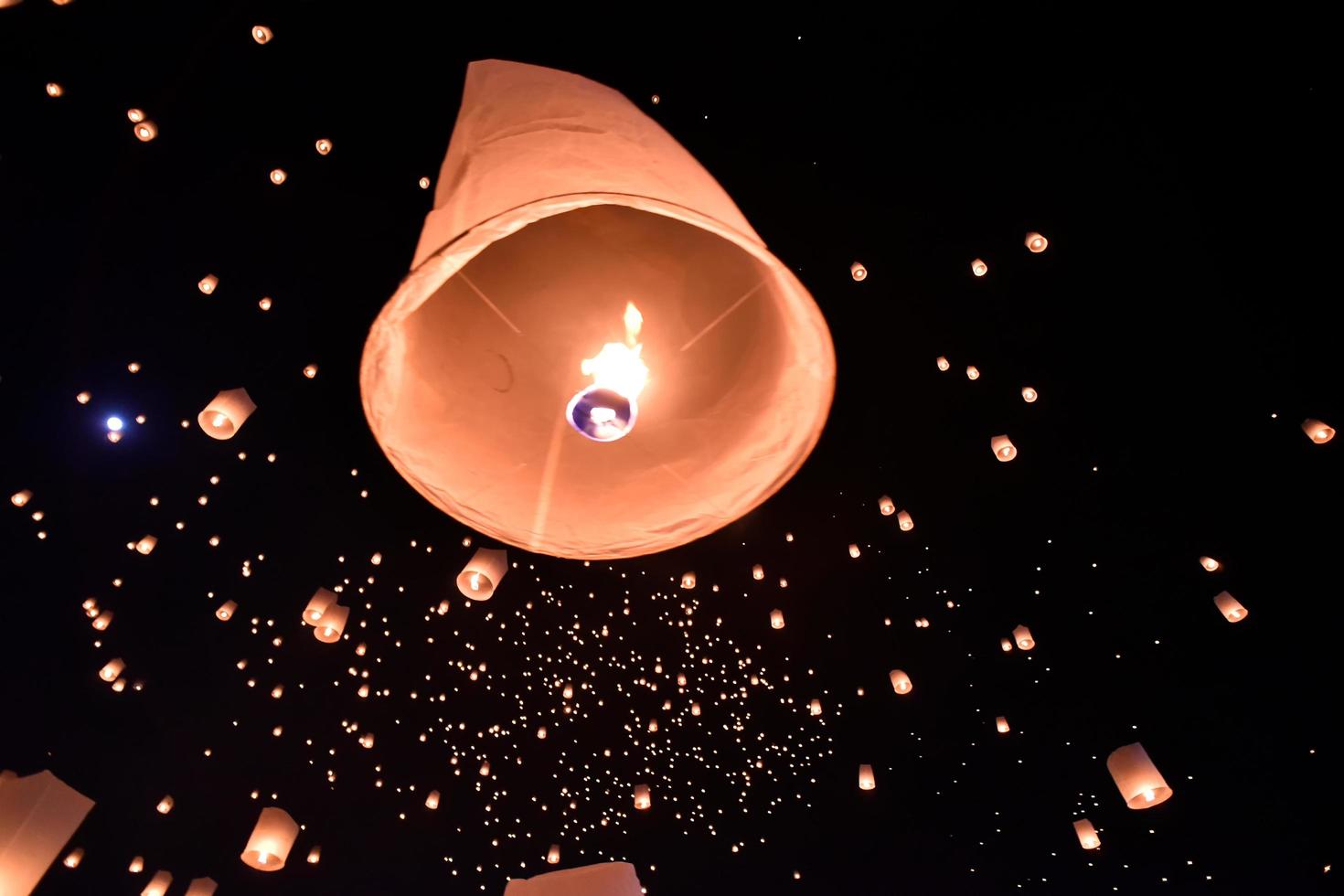 Floating lanterns on sky in Loy Krathong Festival photo