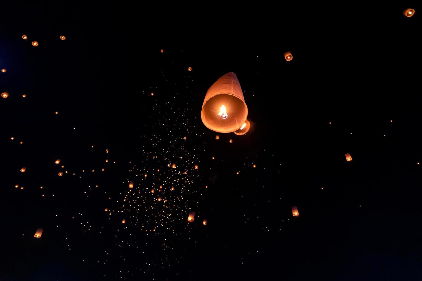 Floating lanterns on sky in Loy Krathong Festival photo