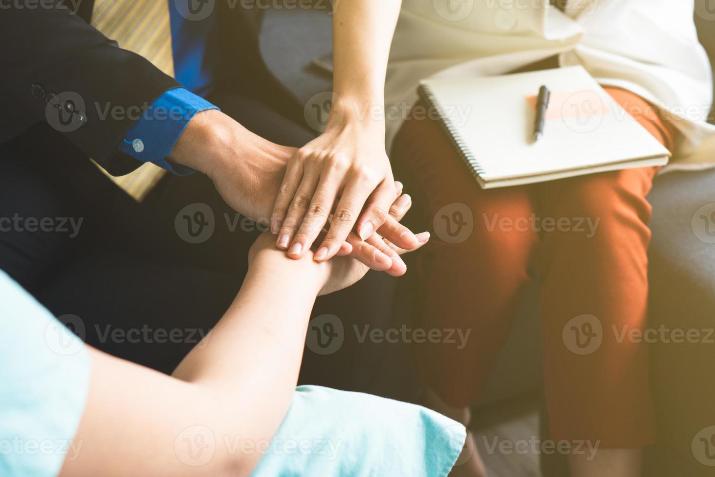 Business team touch hands in office. collaboration in business concept photo