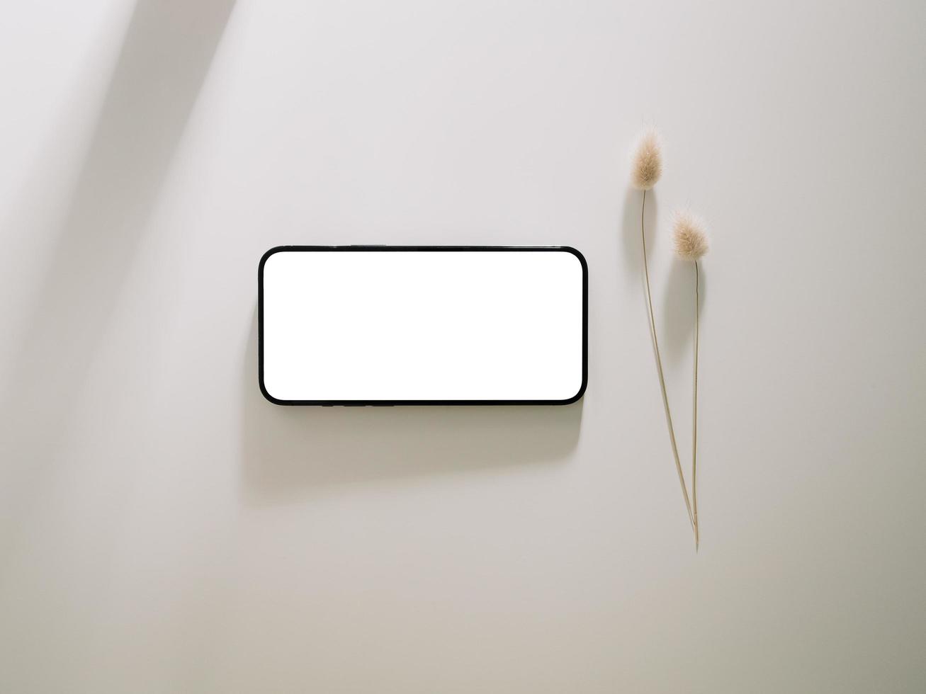 Smartphone mockup, Phone with blank screen template. Flat lay photo