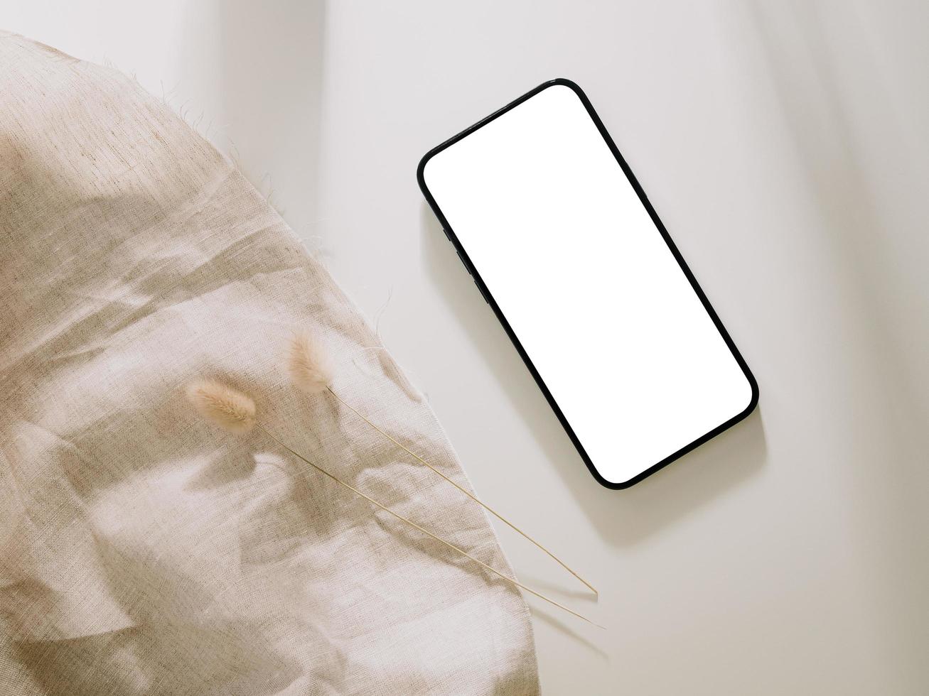 Smartphone mockup, Phone with blank screen template. Flat lay photo