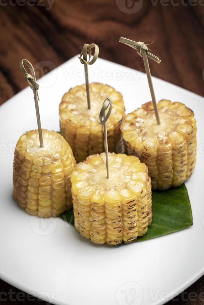 Sweet corn on the cob vegetarian tapas snack food photo