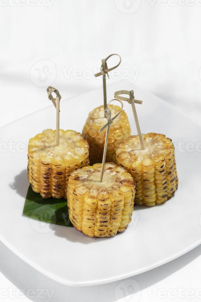 Sweet corn on the cob vegetarian tapas snack food photo