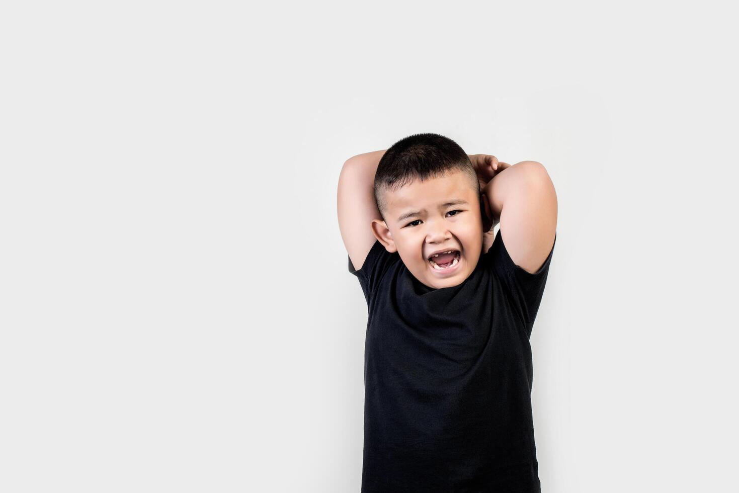 Funny portrait boy studio photo. photo