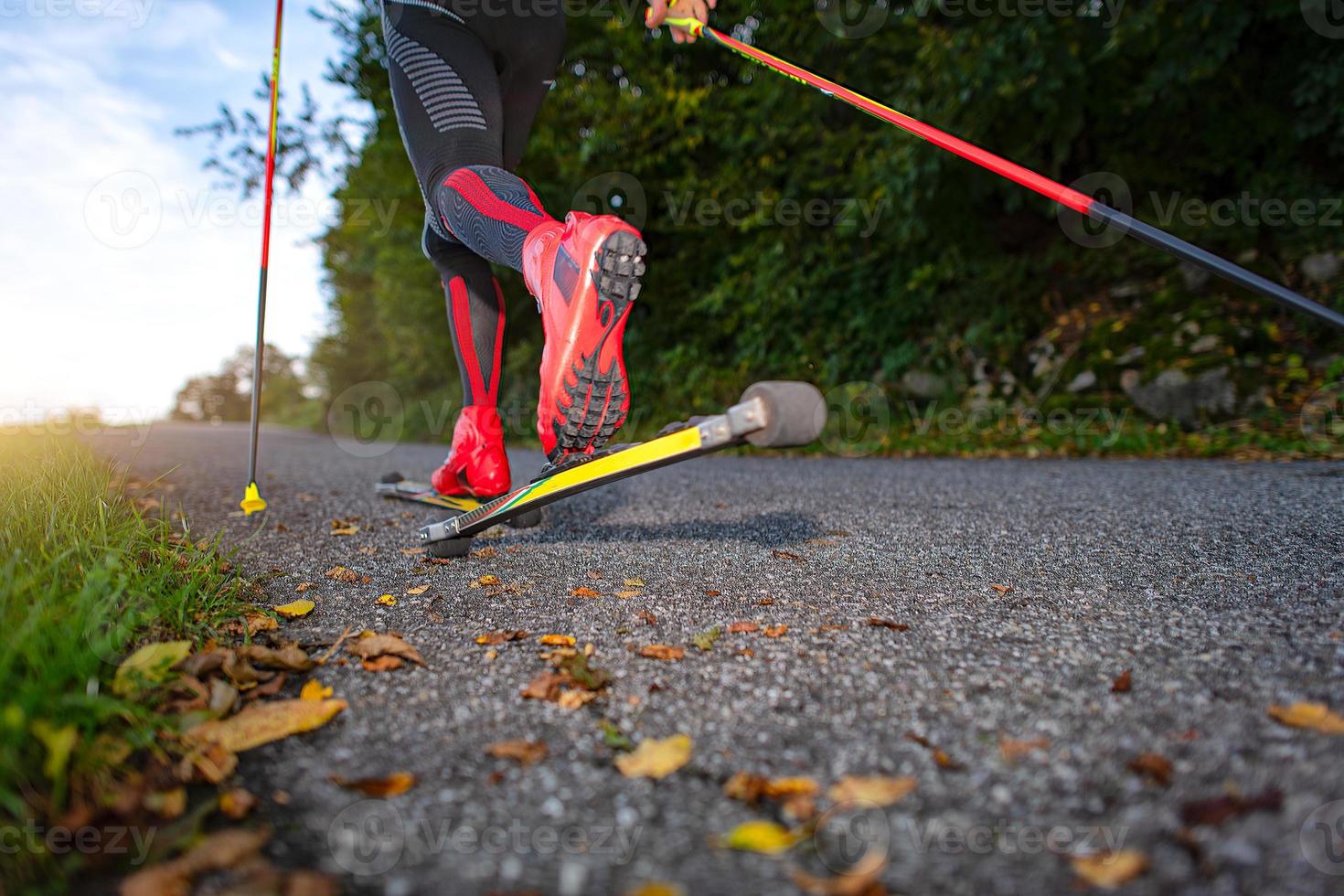 Roller skates on asphalt road. photo