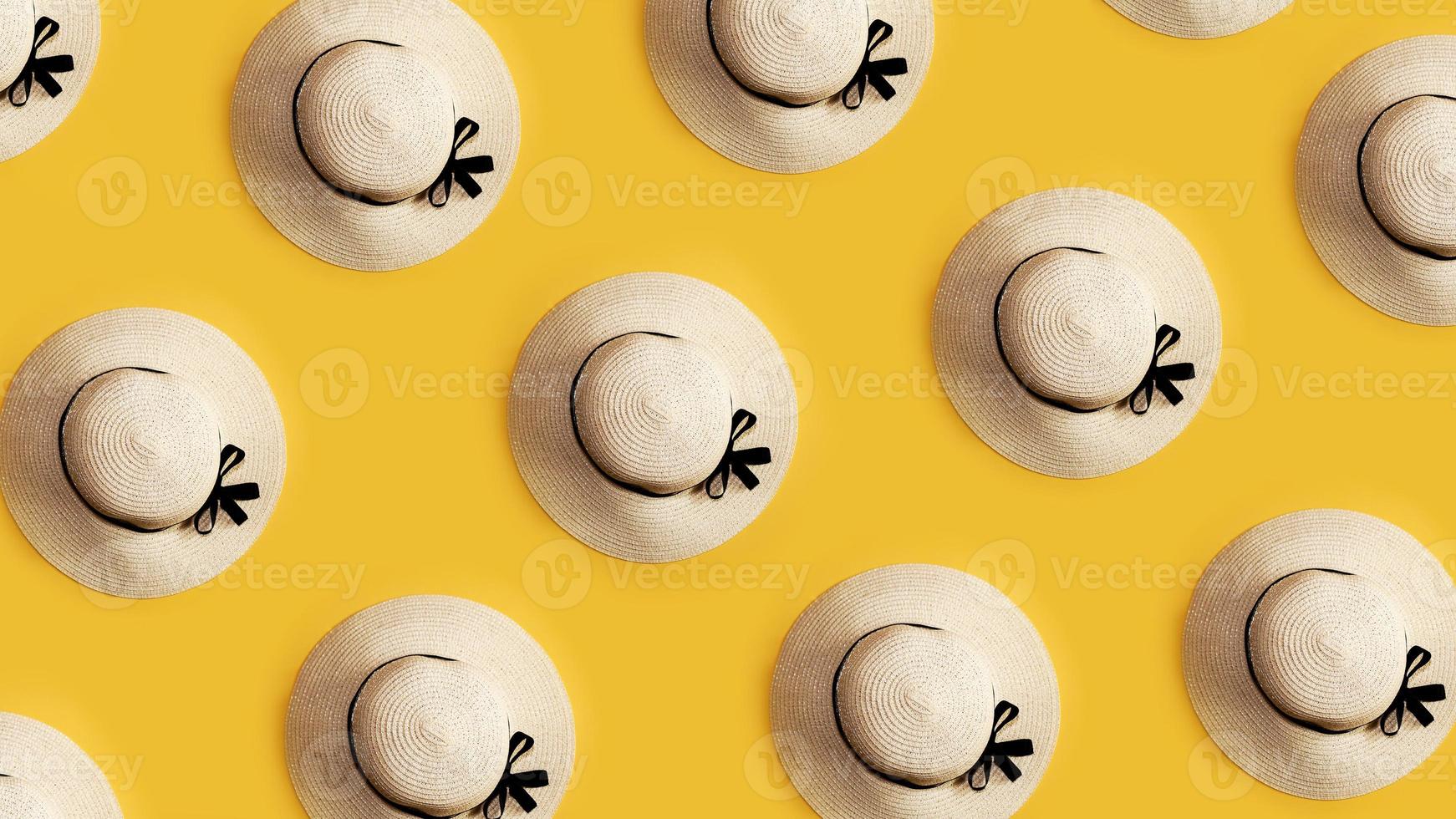 Summer straw hat rows on yellow background - top view flat lay photo