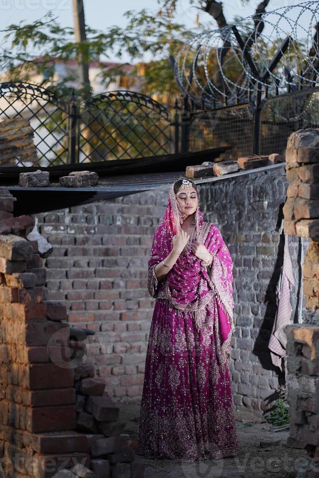 Punjabi girl in bridal wear photo