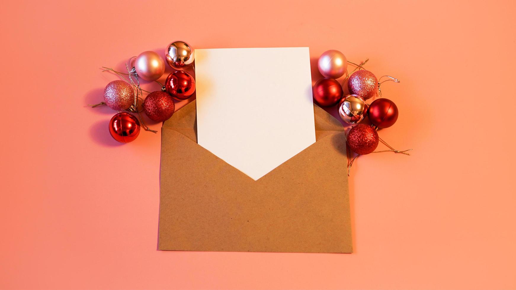 Blank sheet of paper for notes, kraft paper envelope photo