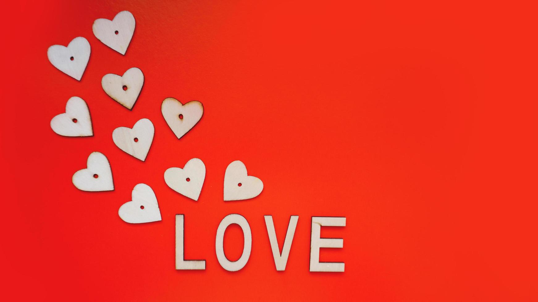 Valentines Day background with red hearts and letters love photo