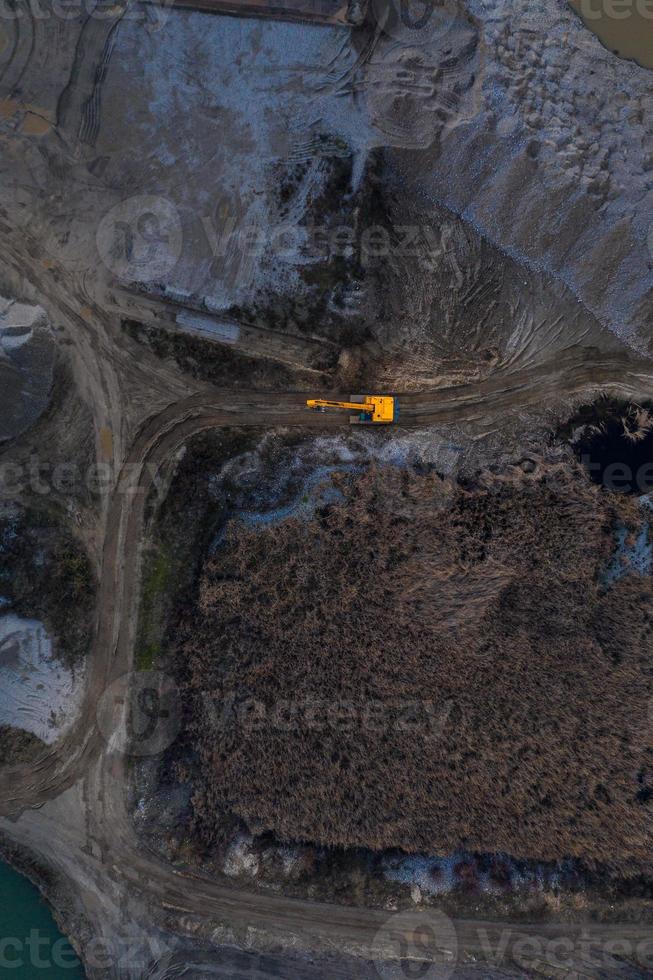 Aerial photo of a yellow digger