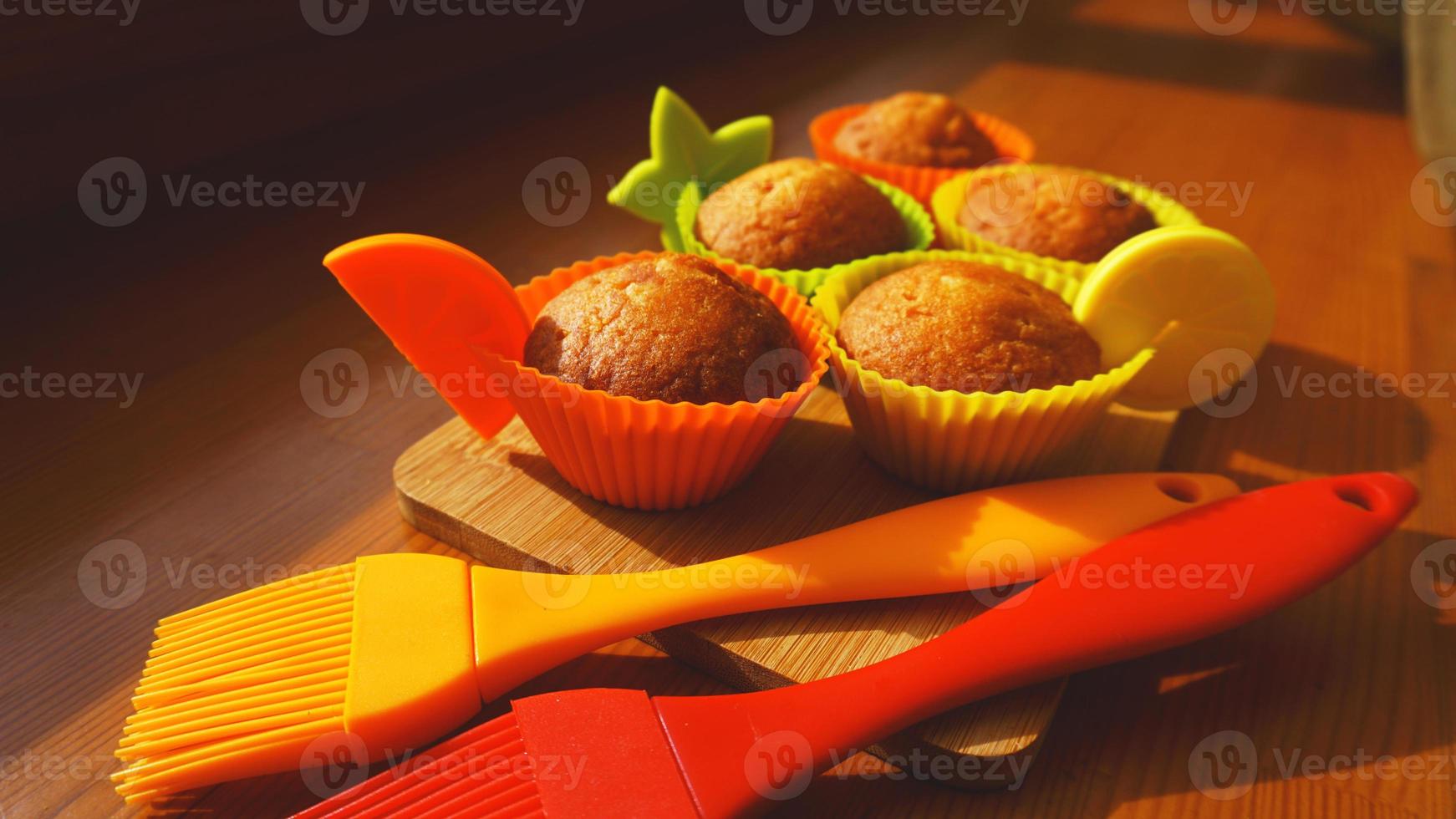 Simple mini muffins in colorful silicone bakeware photo