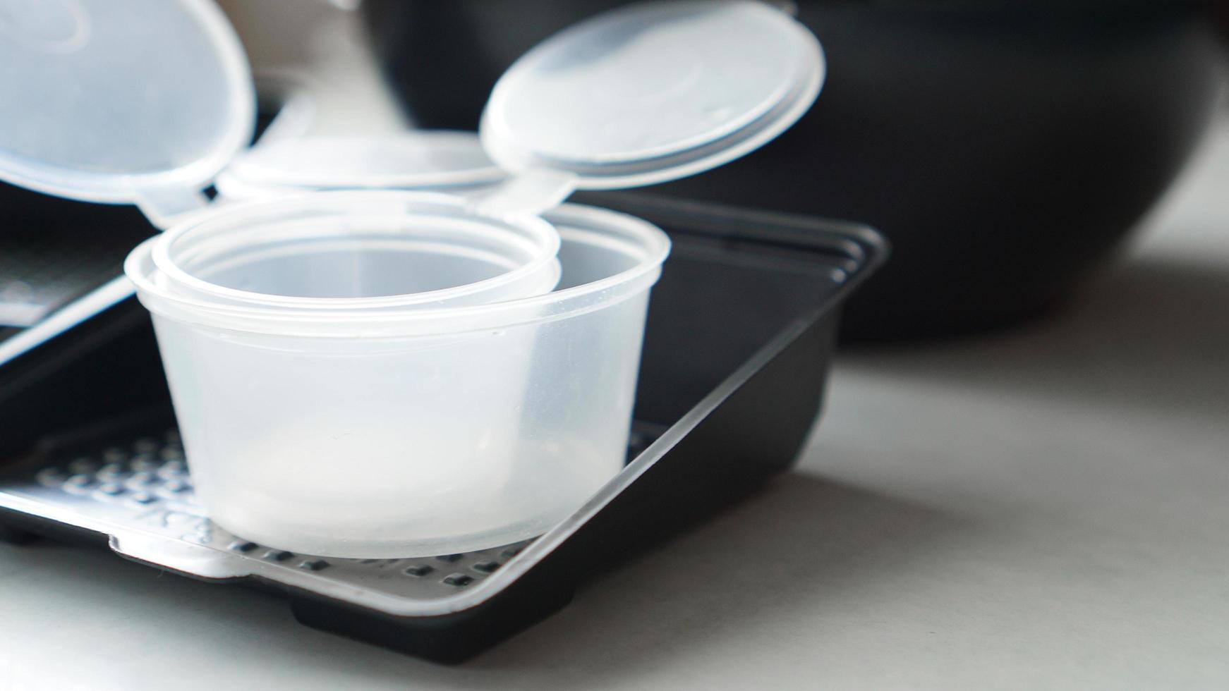 Empty plastic containers for sushi set. Take away photo
