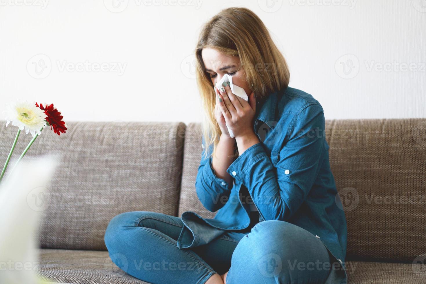 Spring cold or allergies. Attractive girl is allergic photo