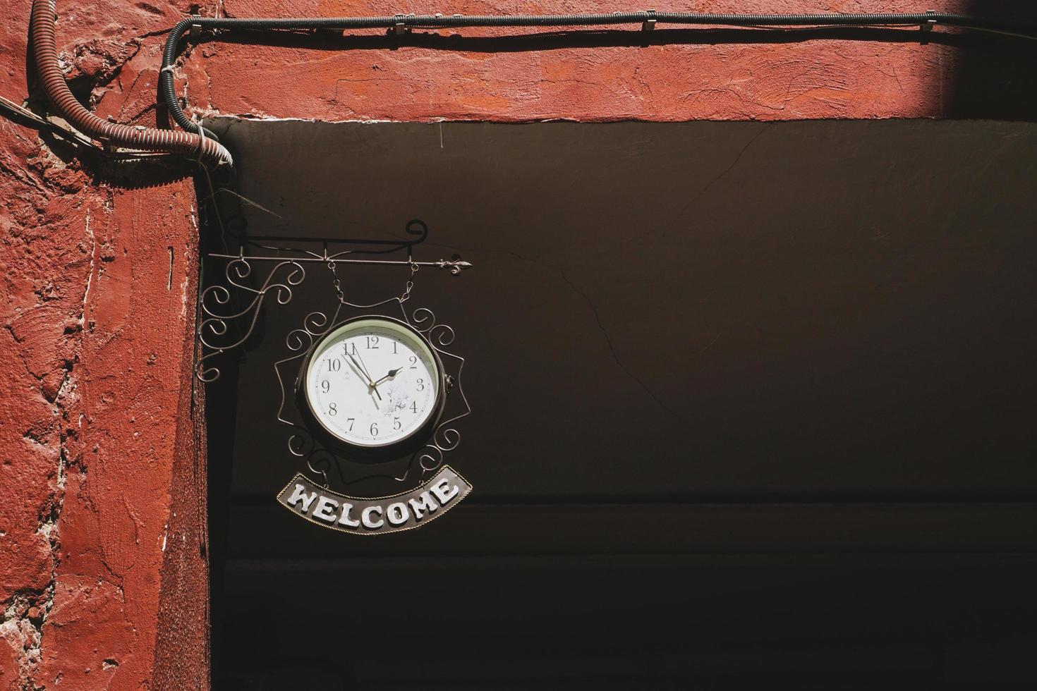 Clock with label Welcome photo