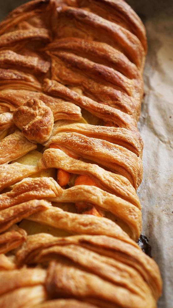 Meat pie with puff pastry. Beautiful golden crust. Tasty Lunch photo