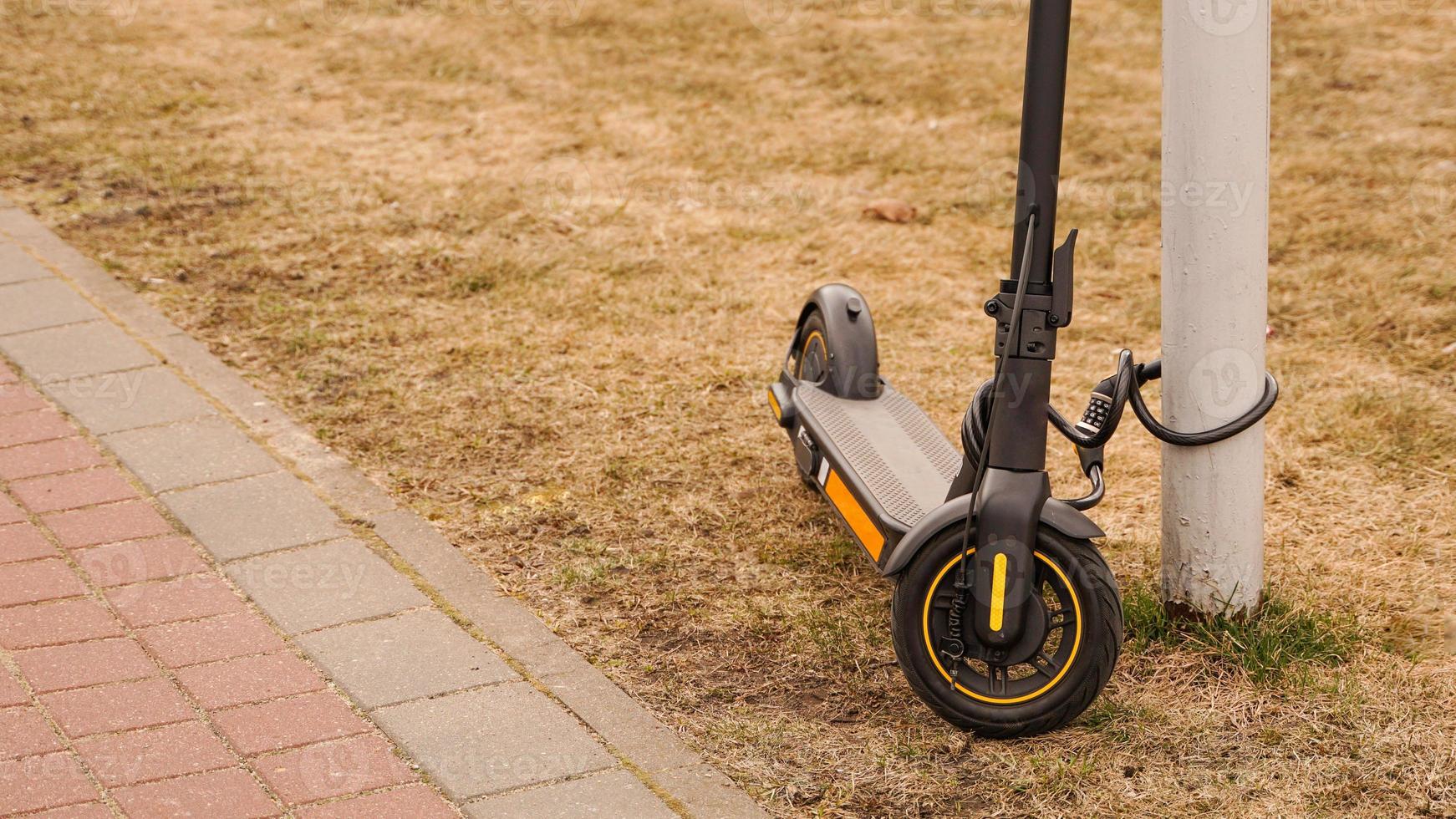 Electric scooter with a combination lock. Anti-theft protection photo