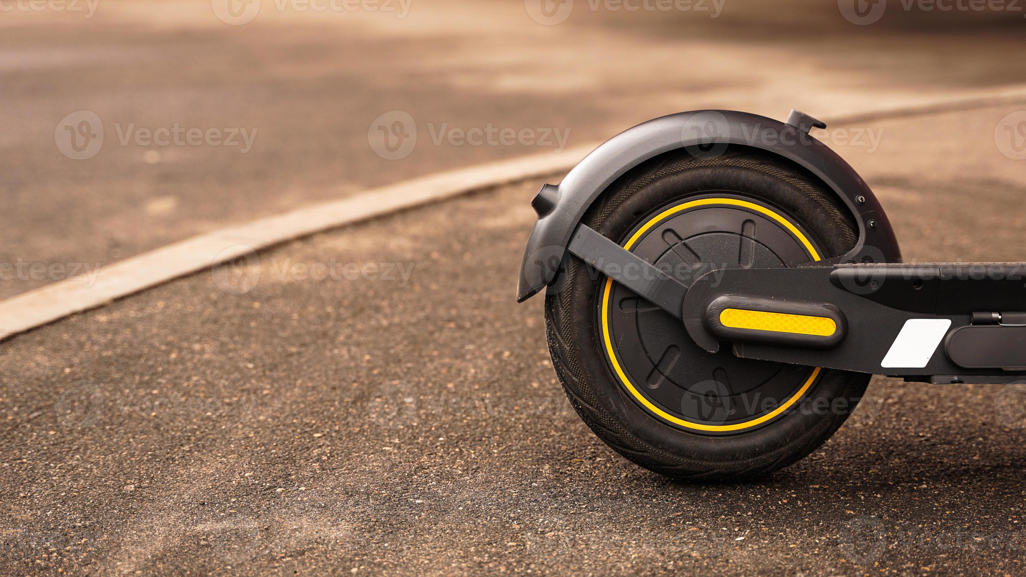Closeup photo of the rear wheel of an electric scooter. 3259127 Stock