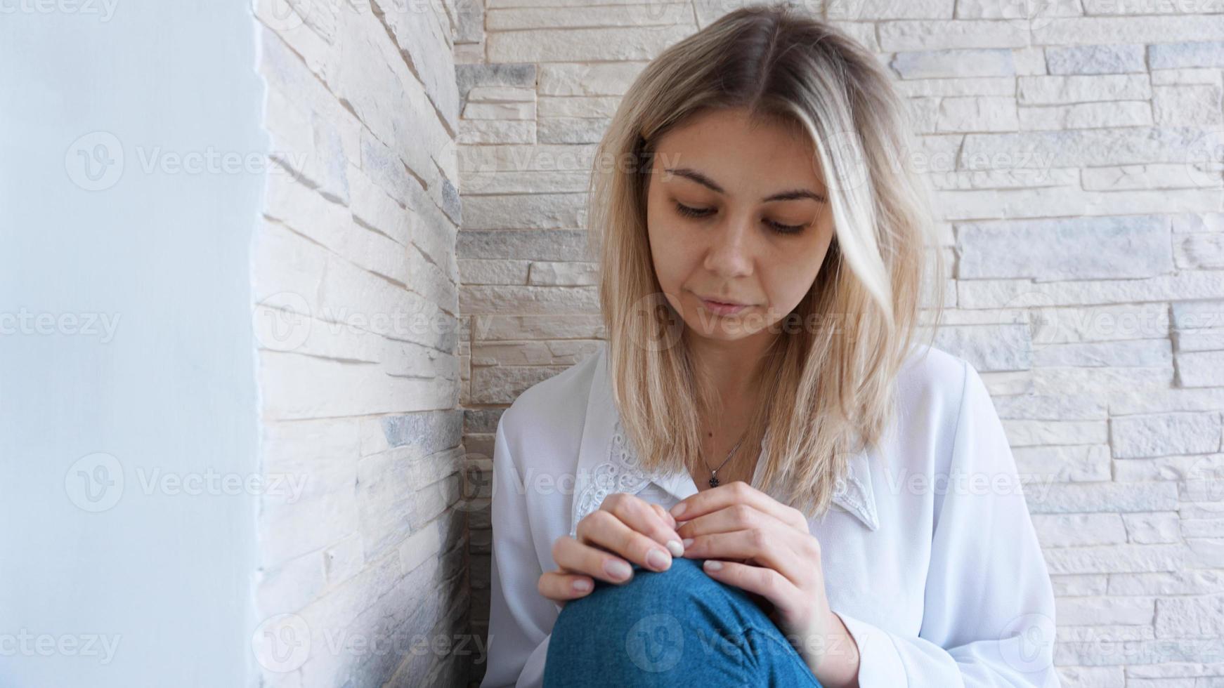 Sad or Depressed Young Beautiful Woman photo