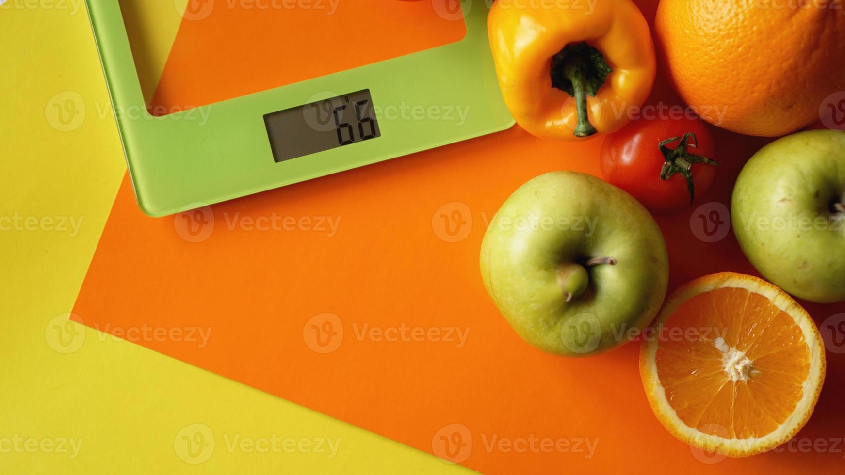 Concept diet. Healthy food, kitchen weight scale photo
