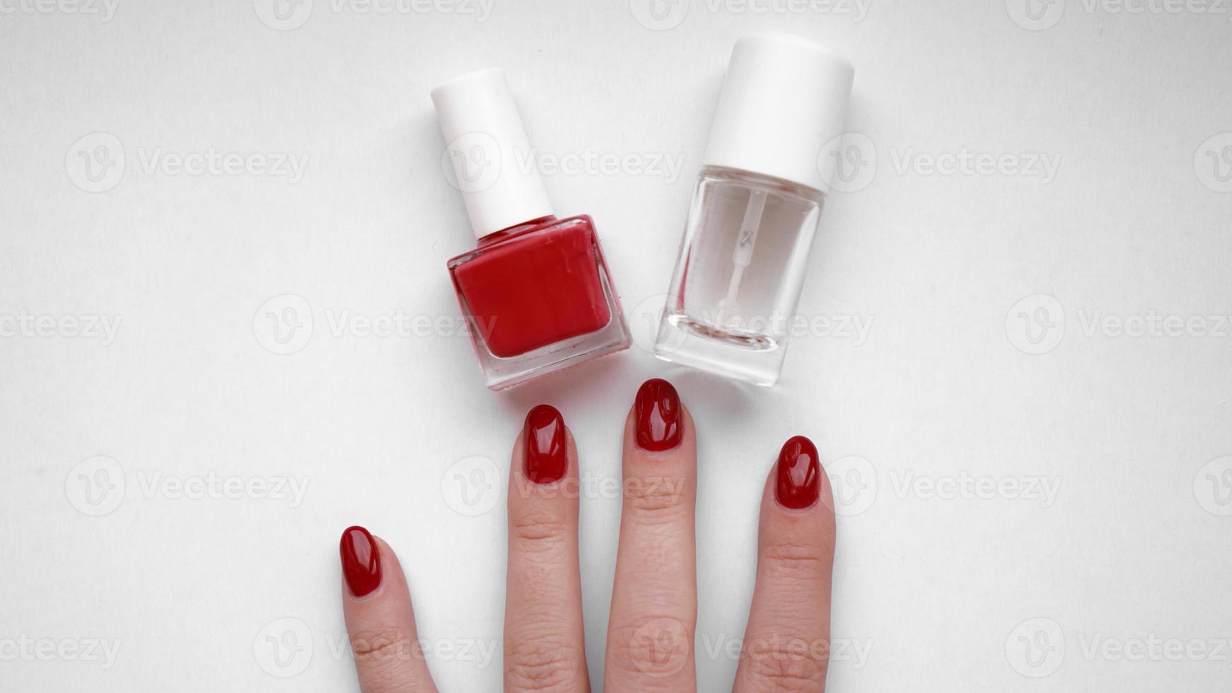 Beautiful female hands. Hand skin care.  With Red Manicure photo