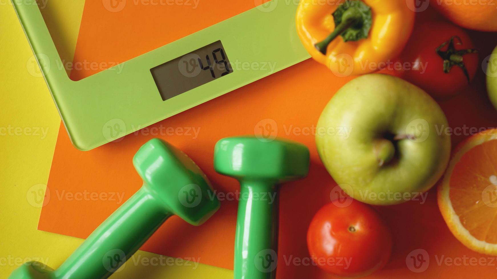 Concept diet. Healthy food, kitchen weight scale photo