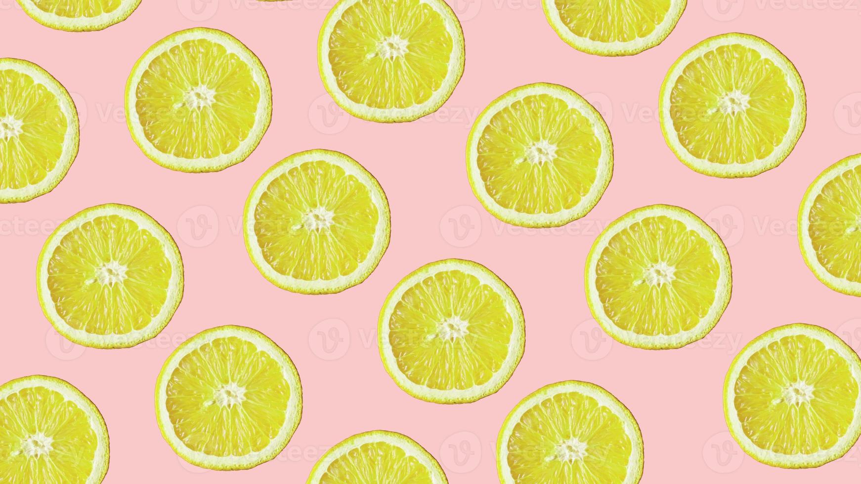 Top view of colorful fruit pattern of fresh lemon on pink background photo