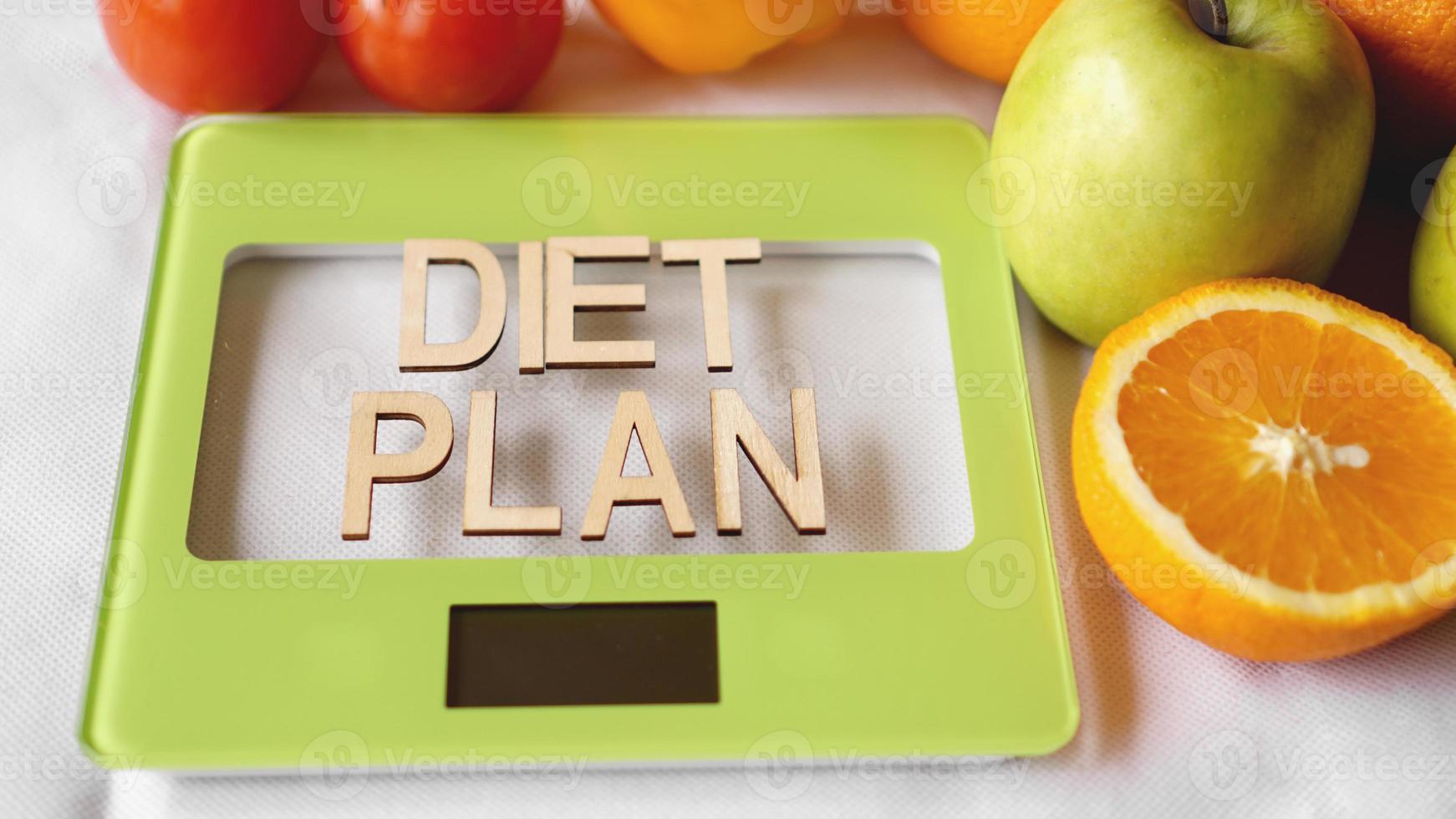 Concept diet. Healthy food, kitchen weight scale photo