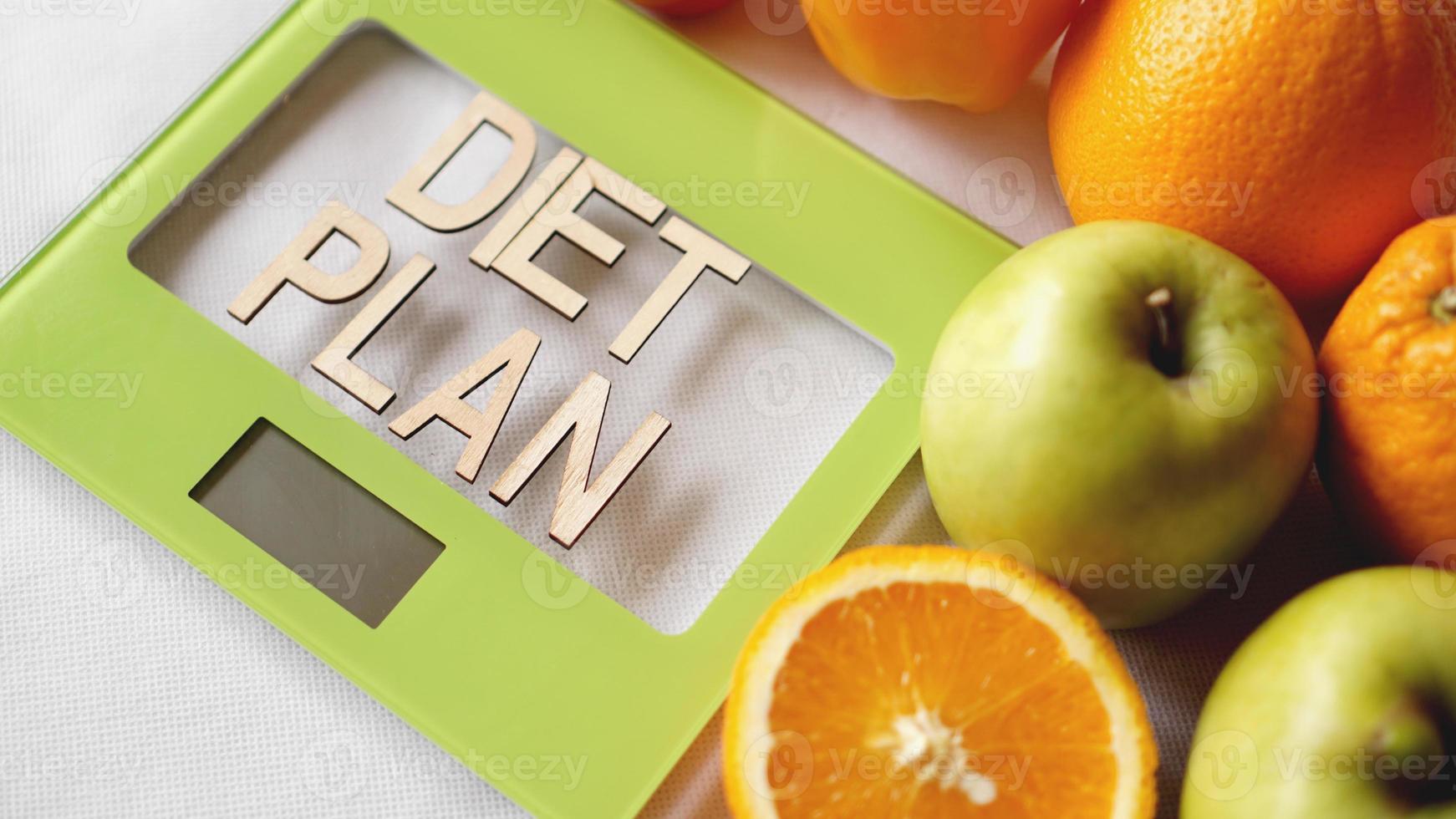 Concept diet. Healthy food, kitchen weight scale photo