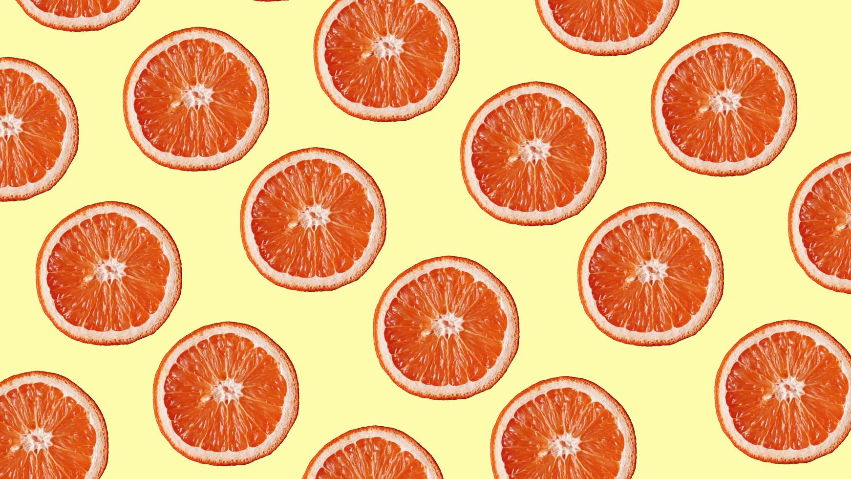 Grapefruit pattern on yellow background. Minimal flat lay concept. photo