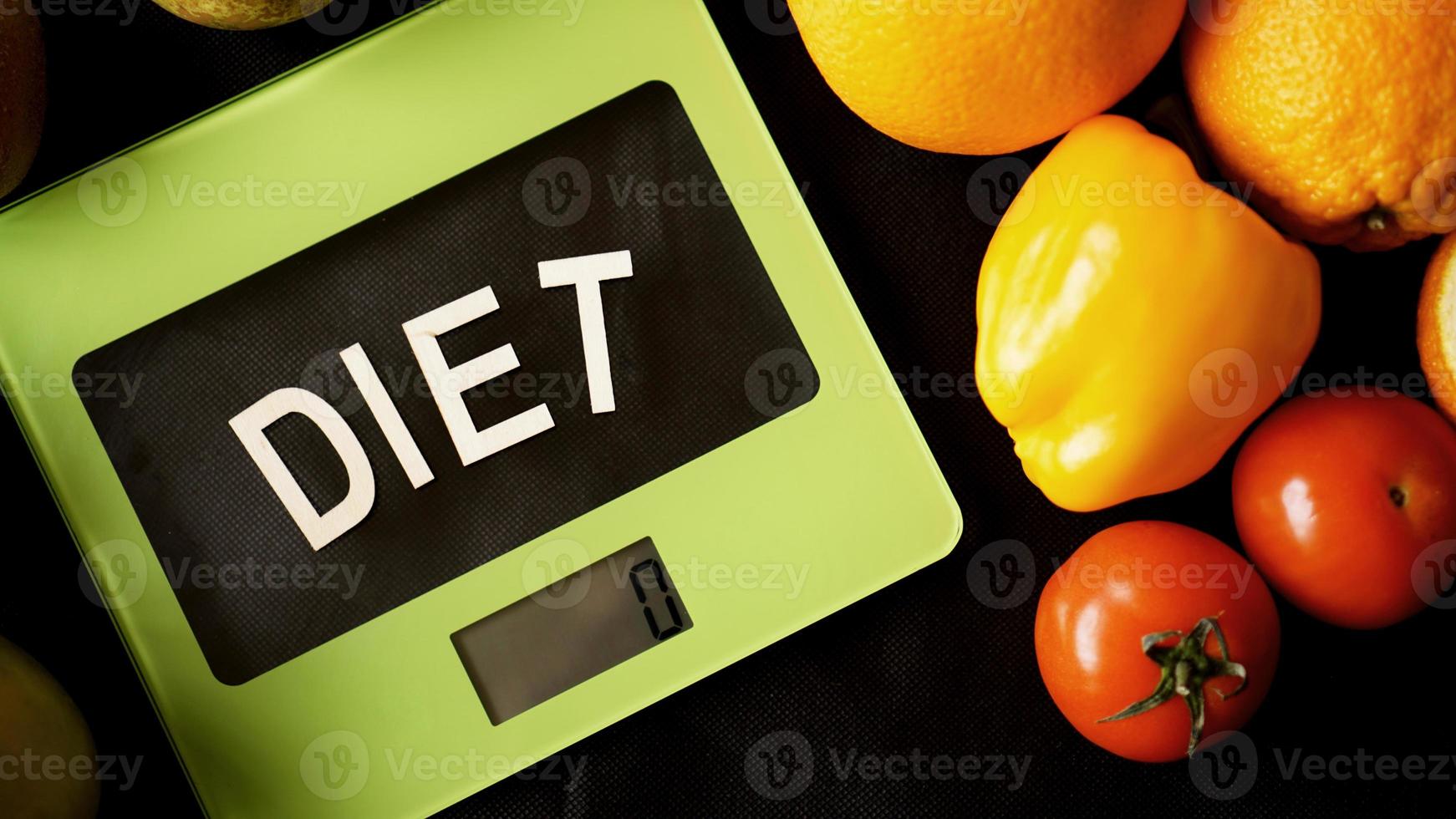 Concept diet. Healthy food, kitchen weight scale photo