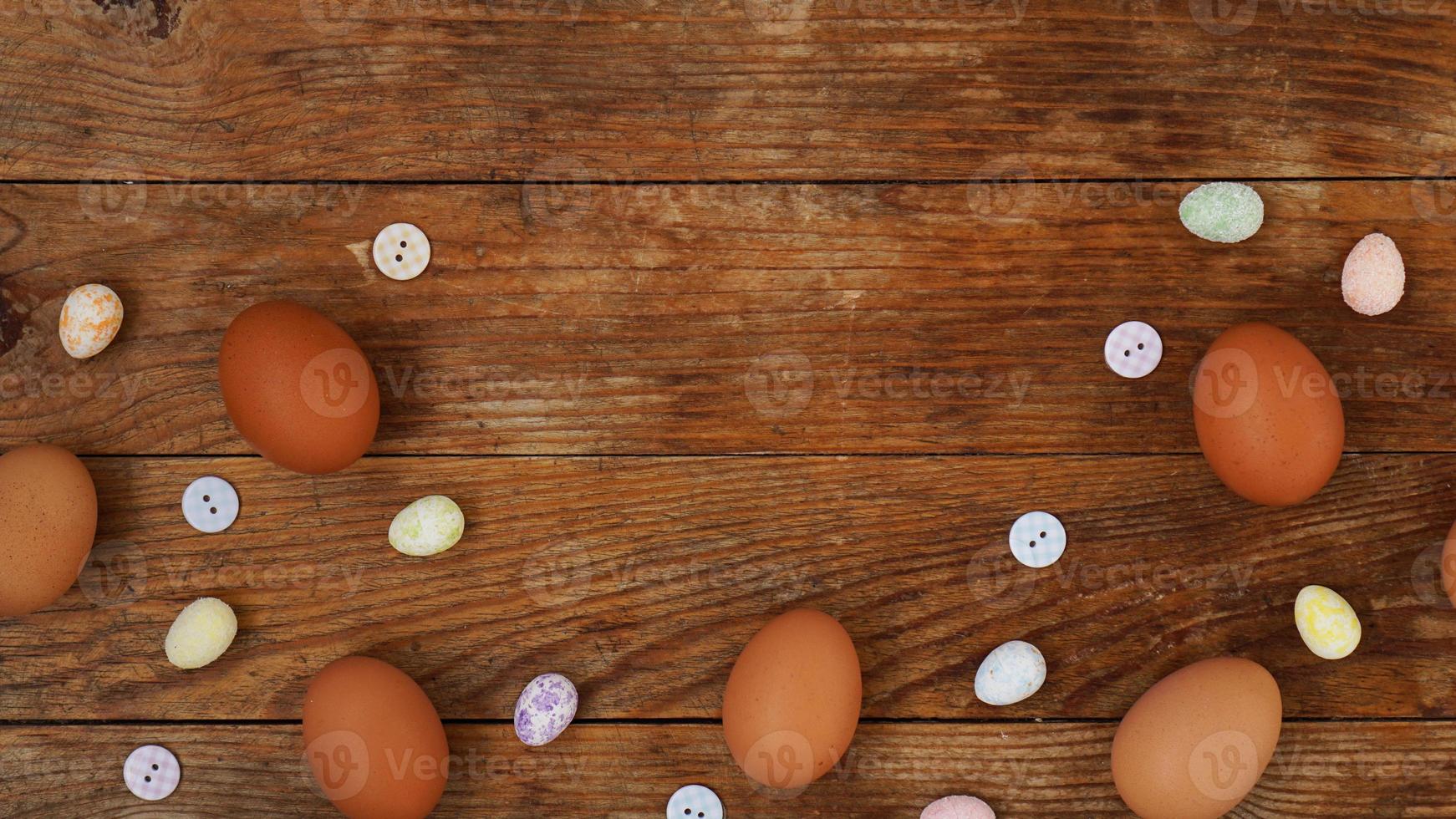 Eggs on a wooden rustic background with copy space for text. photo
