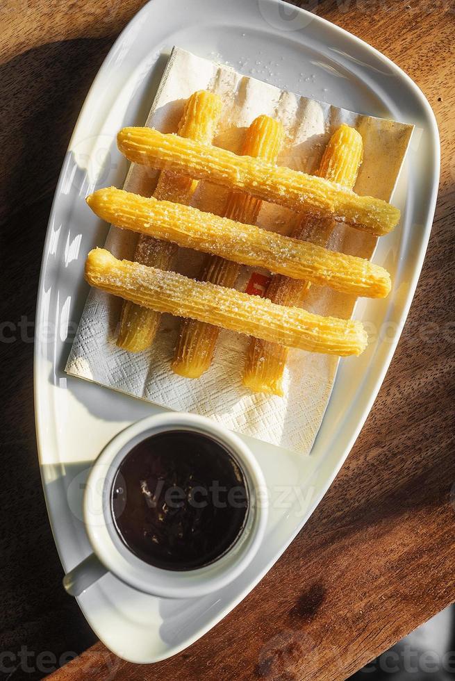 Famous Spanish churros with chocolate traditional Spain sweet tapa breakfast photo