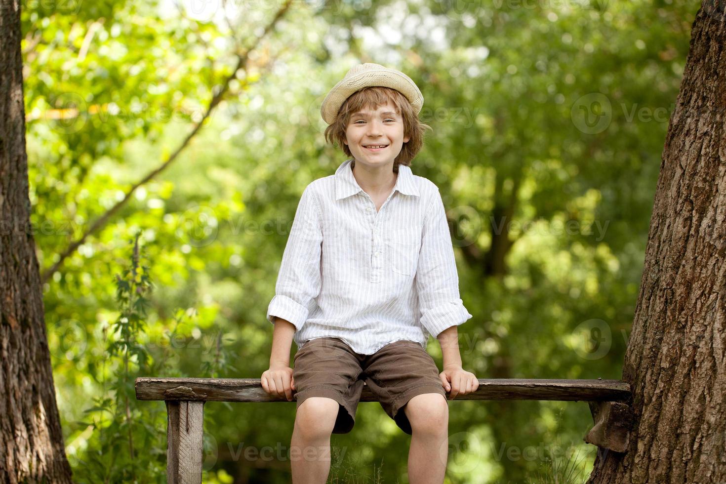 Gay boy in a hat and shirt photo
