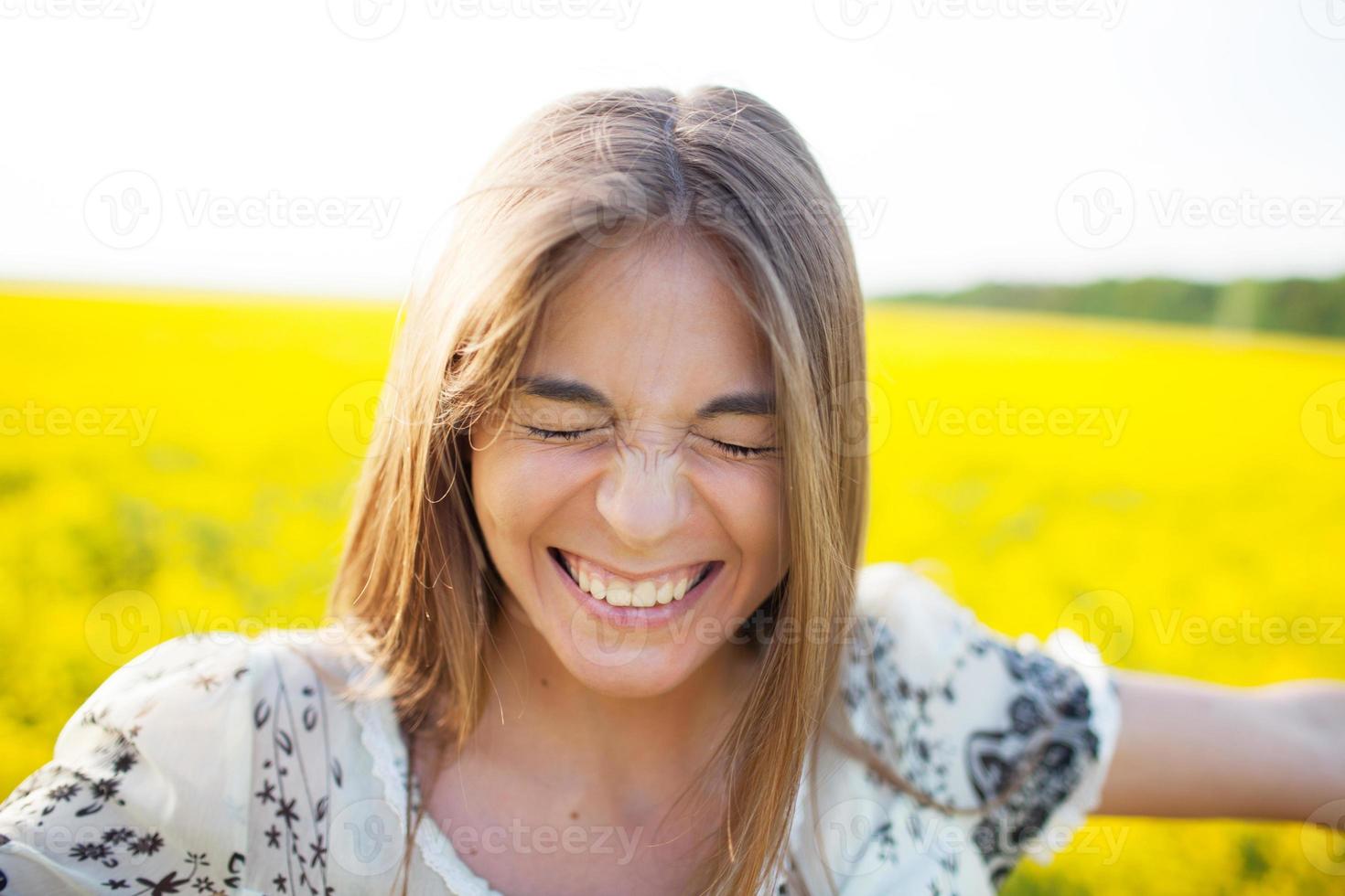 Young woman blinked from pleasure photo
