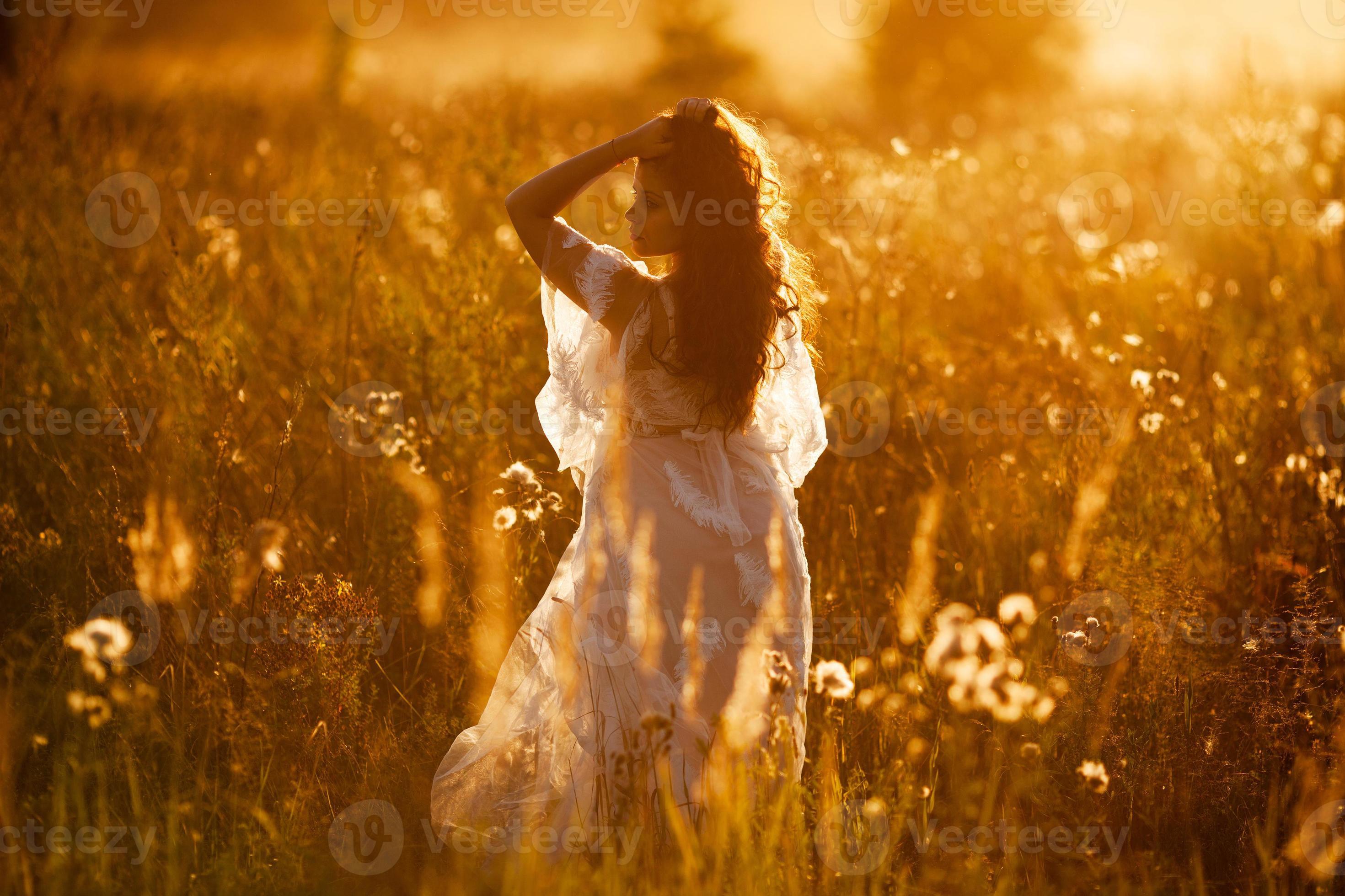 girl in field sunset