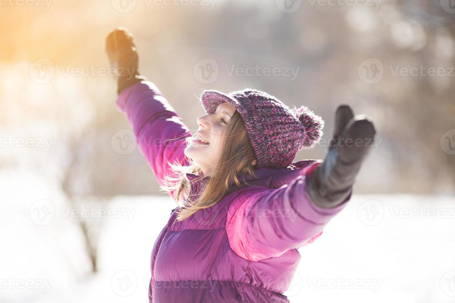 Ecstatic girl in burgundy hat photo