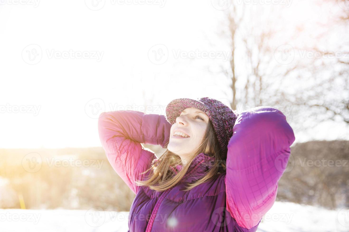 Happy girl in a knitted hat photo