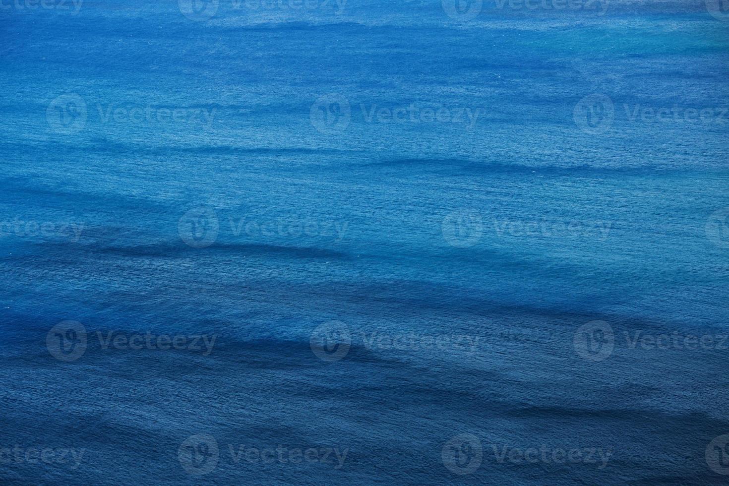 Surface of the ocean with small waves photo