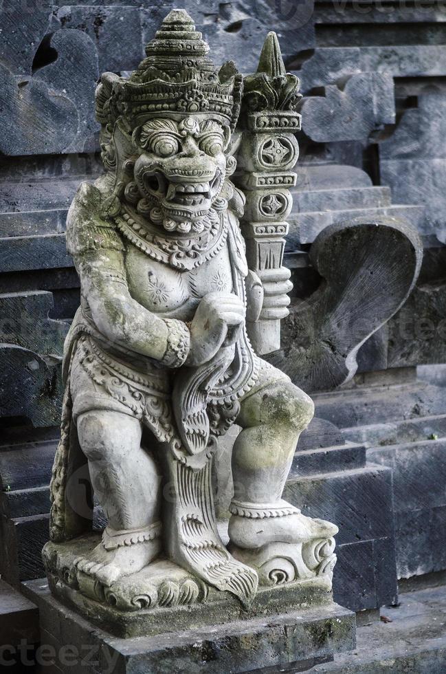 Traditional ancient Balinese Hindu statues in Bali temple Indonesia photo