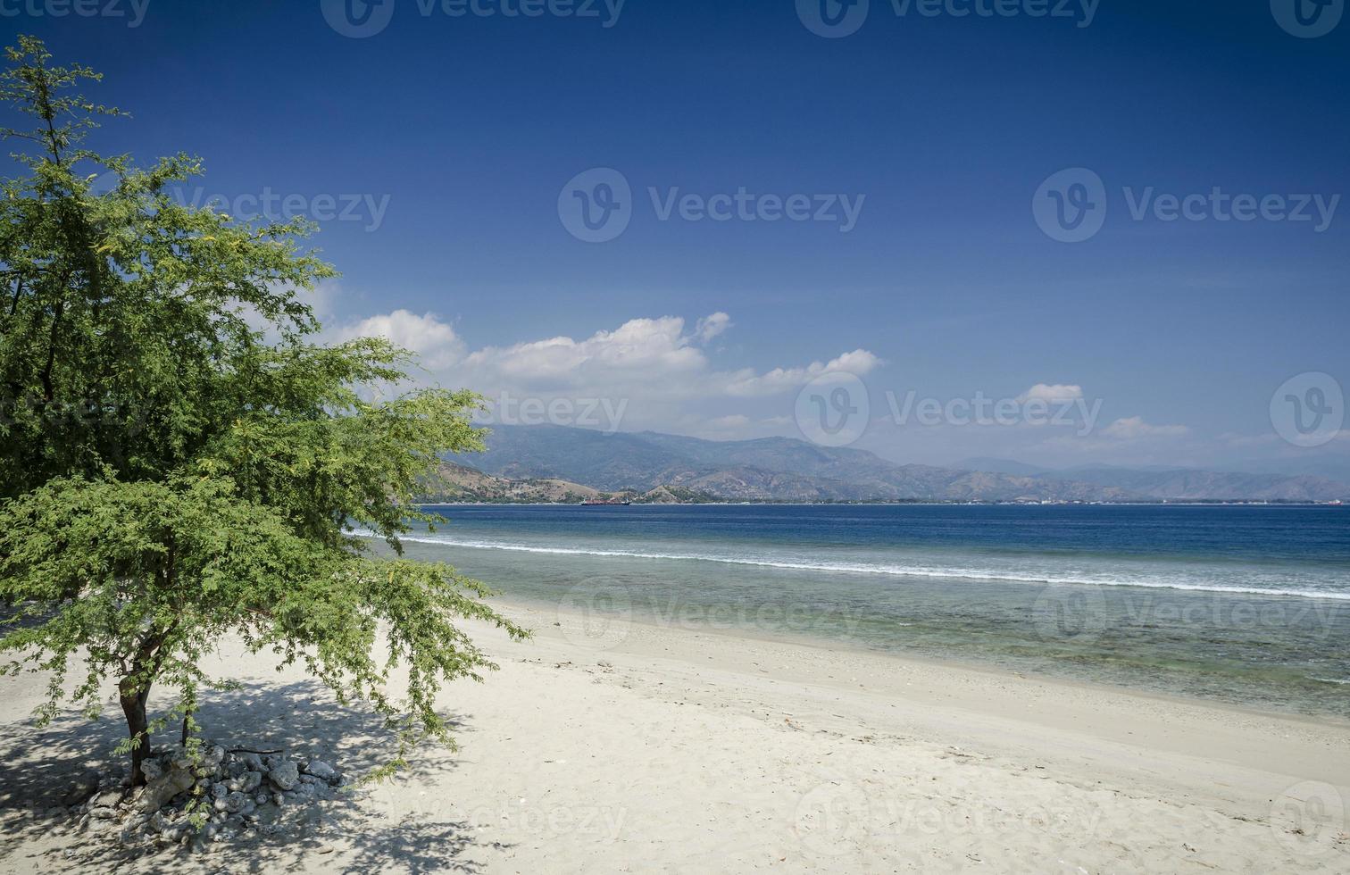 Areia Branca tropical beach view and coast near Dili in East Timor photo