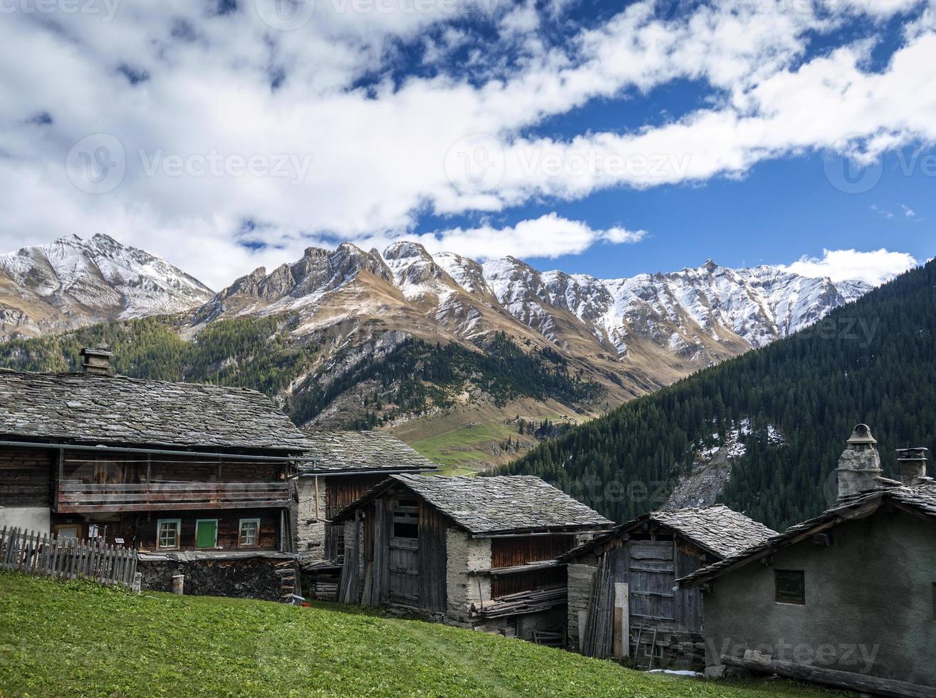 Traditional swiss alps rural houses in Vals village alpine Switzerland photo