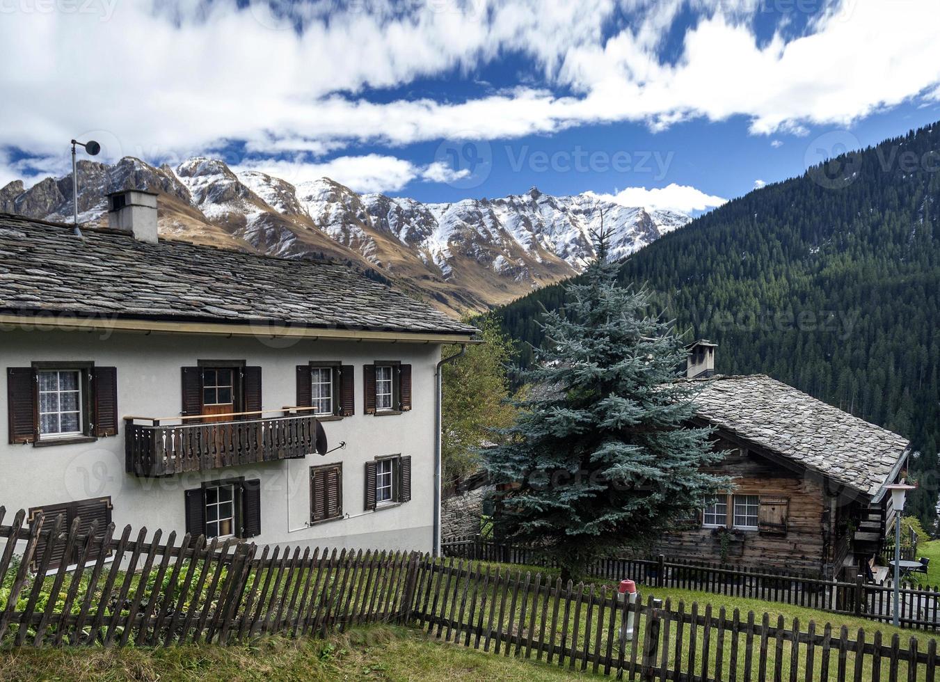 Traditional swiss alps rural houses in Vals village alpine Switzerland photo