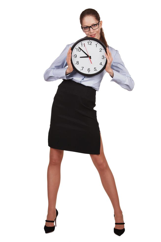 Stylish woman with a round clock in hands photo