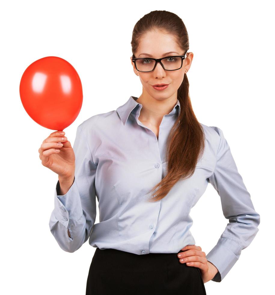 Pretty woman with inflated red ball photo