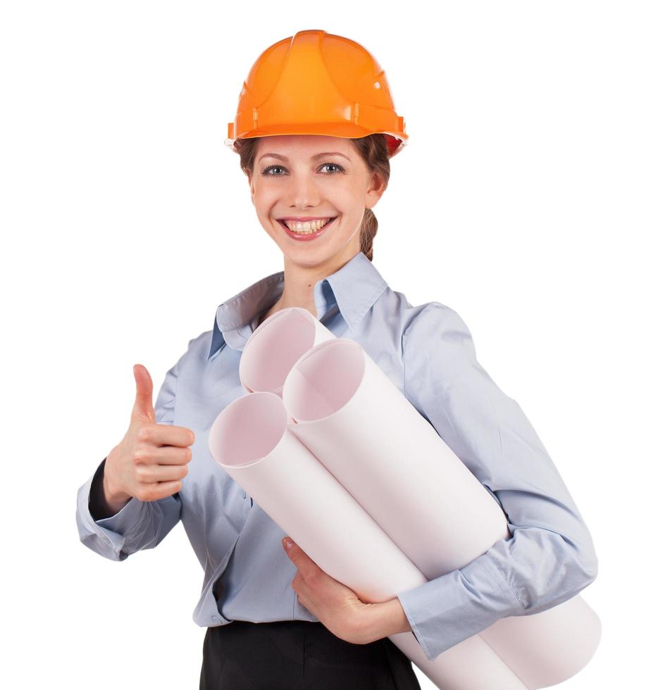 mujer - ingeniero en un casco protector foto