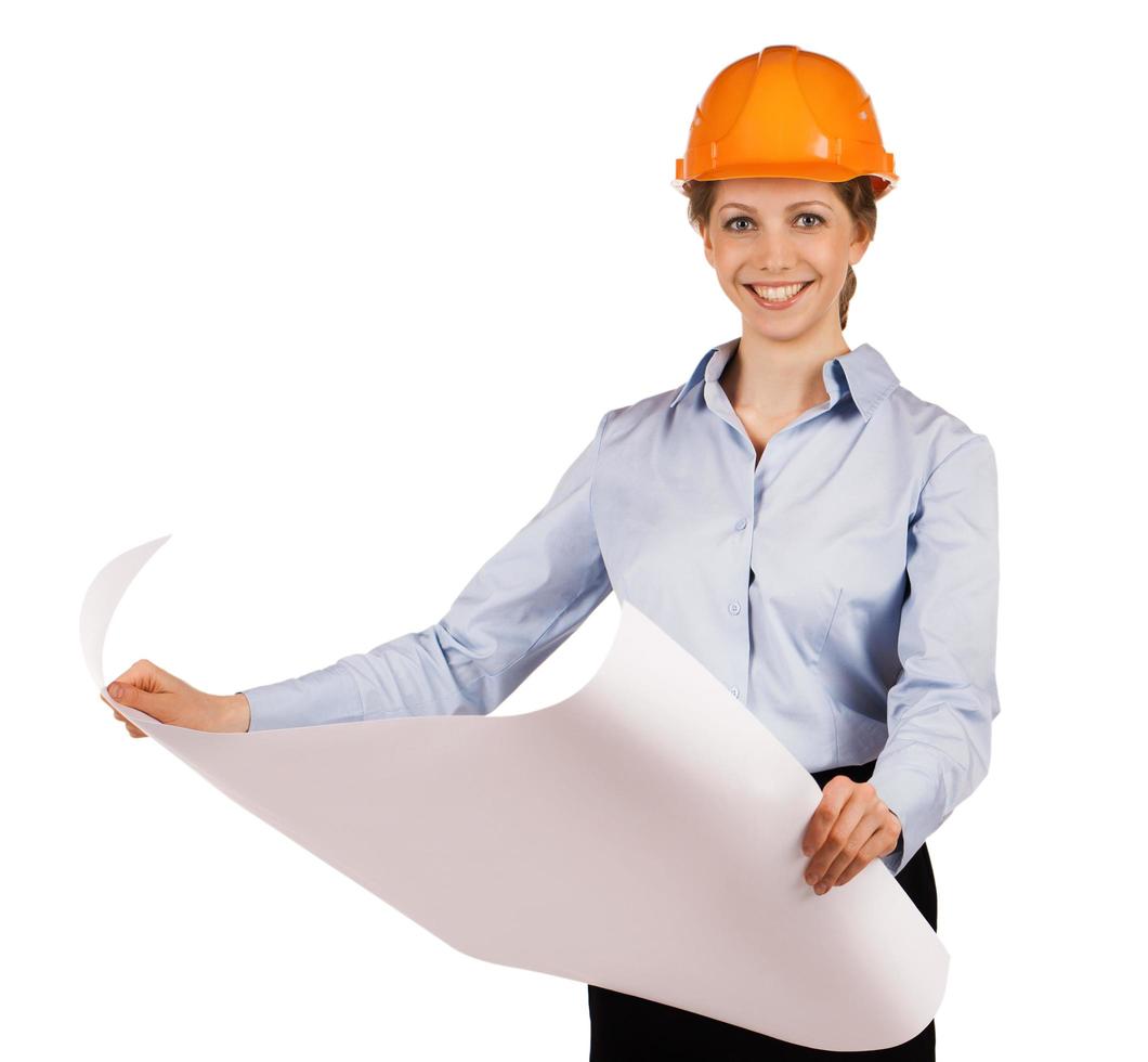 Woman in helmet with a detailed plan photo